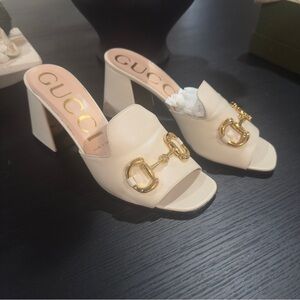Gucci Women's Cream Mules with Gold Accents